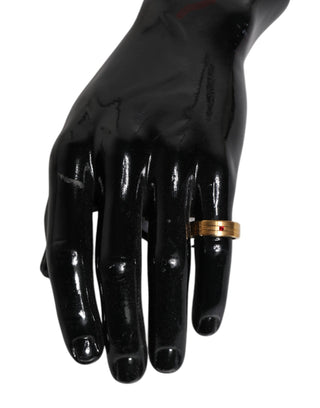Goldfarbener Messingring mit roten Kristallen und DG Logo