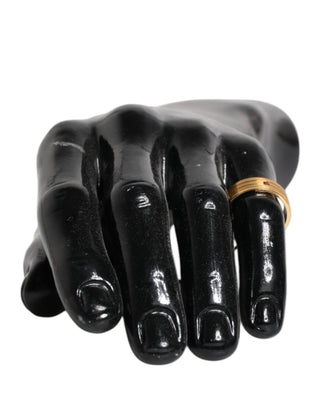 Goldfarbener Messingring mit roten Kristallen und DG Logo
