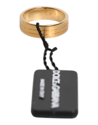 Goldfarbener Messingring mit roten Kristallen und DG Logo