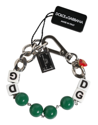 Pulsera con dijes de dados y logo de latón plateado  