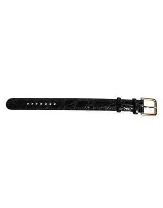 Brazalete de cuero exótico negro con hebilla metálica dorada  