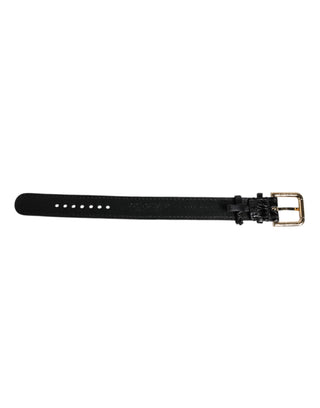 Brazalete de cuero exótico negro con hebilla metálica dorada  