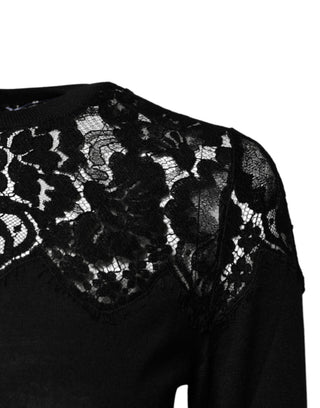 Schwarze Bluse mit langen Ärmeln und Blumenmuster-Spitze