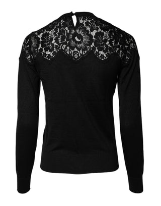 Schwarze Bluse mit langen Ärmeln und Blumenmuster-Spitze
