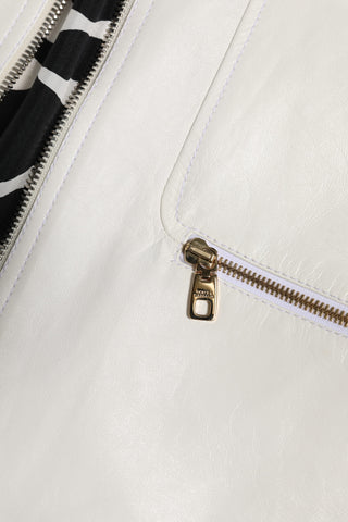 Chaqueta abrigo blanca con cuello y cremallera completa estilo biker