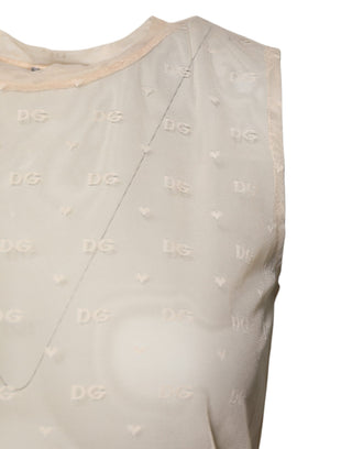 Top sin mangas color marfil de nailon con logo y transparencia