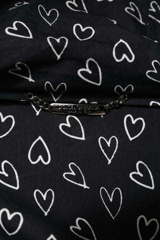 Schwarze Kapuzen-Windbreaker-Jacke mit Herz-Print