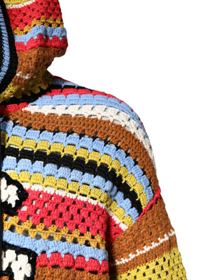 Colorful crocheted sweater with a pattern on a white background