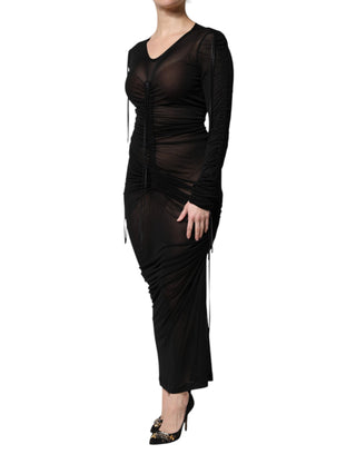Vestido ajustado negro con ribete de malla y manga larga  
