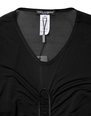 Vestido ajustado negro con ribete de malla y manga larga  