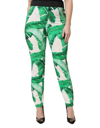 Pantalones blancos de talle alto con hojas verdes
