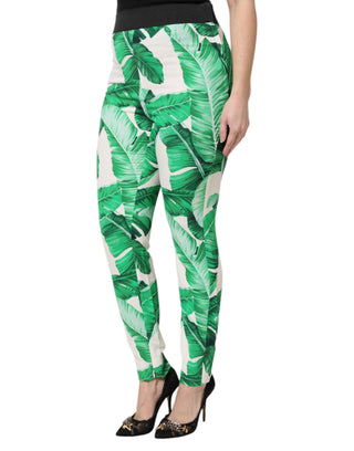 Pantalones blancos de talle alto con hojas verdes