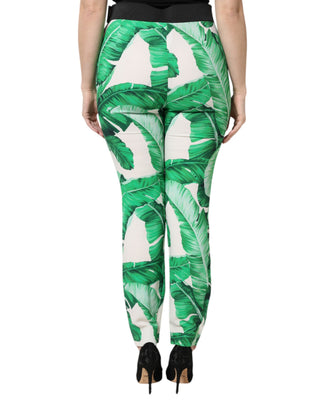 Pantalones blancos de talle alto con hojas verdes
