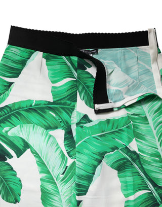 Pantalones blancos de talle alto con hojas verdes