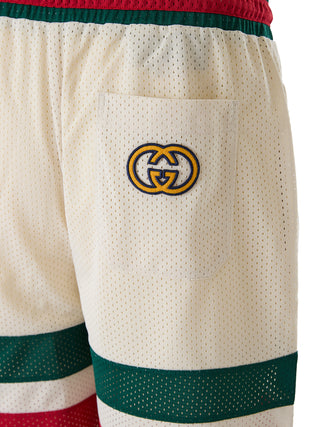 Pantalones cortos crema de poliéster con logo