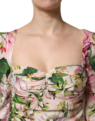 Vestido midi rosa de seda floral ajustado y con vuelo