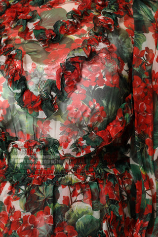Vestido multicolor de manga larga con volantes y flores  