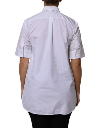 Polo blanco de algodón con mangas cortas y cuello