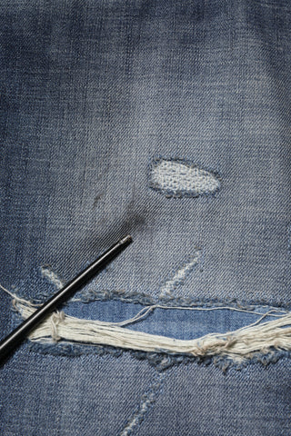 Jeans para hombre de algodón lavado azul con desgastes