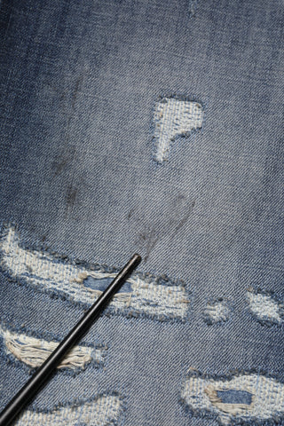 Jeans para hombre de algodón lavado azul con desgastes