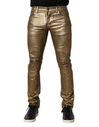 Jeans ajustados de mezclilla de algodón elástico dorado con desgastes