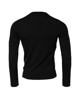 Suéter negro de manga larga con cuello redondo
