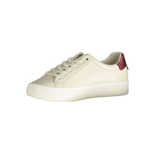 Zapatilla femenina de cuero beige