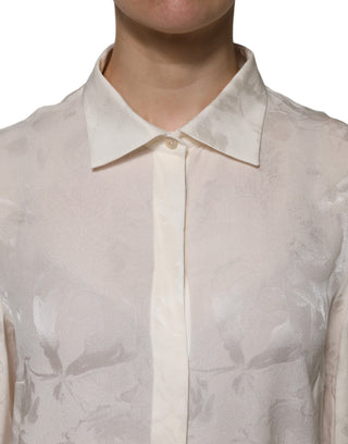 Blusa blanca con botones y mangas largas