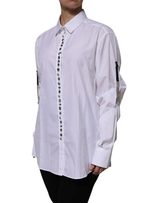 Top blanco con mangas largas y adornos de pedrería