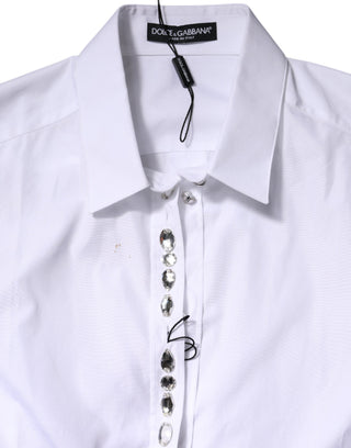 Top blanco con mangas largas y adornos de pedrería