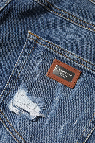 Blaue zerfetzte Baumwoll-Jeans mit niedriger Taille