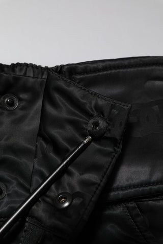 Schwarze Nylonhose mit geradem Bein und DG-Logo