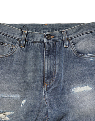 Blaue, ausgewaschene, zerrissene Jeans im Straight Fit
