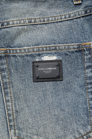 Blaue, ausgewaschene, zerrissene Jeans im Straight Fit