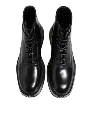 Botines negros de cuero con logo y cordones