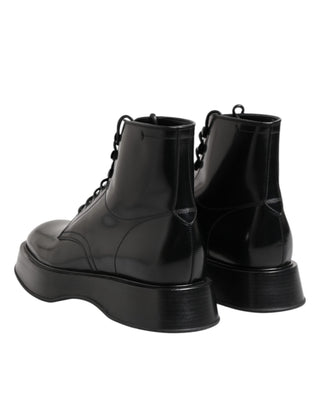 Botines negros de cuero con logo y cordones