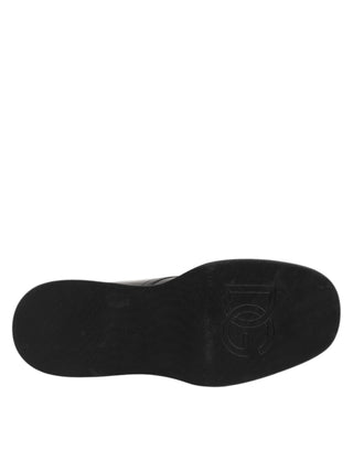 Botines negros de cuero con logo y cordones