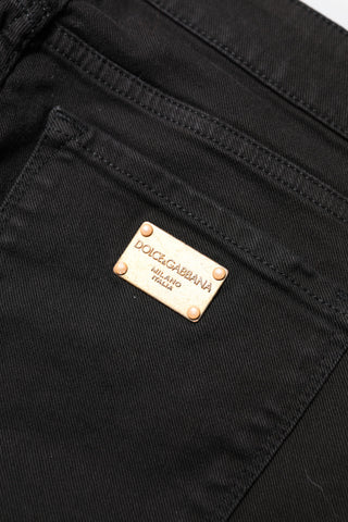 Schwarze, mittelhohe Röhrenjeans aus Baumwolle