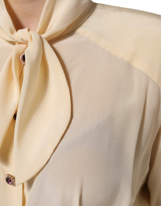 Hellgelbe Bluse mit Ascotkragen und Knöpfen