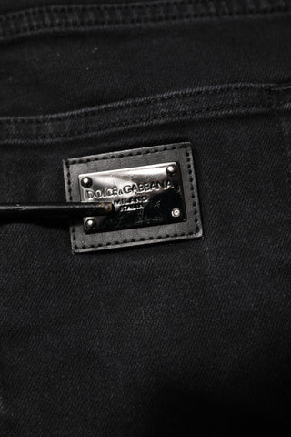 Schwarze Baumwoll-Denim-Jeans mit Logo-Plakette und schmaler Passform