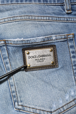 Blue Washed Tattered Logo Plaque Denim Jeans