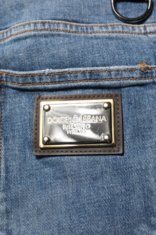 Blaue zerfetzte Skinny Jeans mit Logo aus Baumwolle