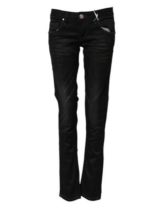 Jeans de mezclilla ajustados de algodón negro con cintura baja
