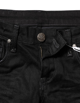 Jeans de mezclilla ajustados de algodón negro con cintura baja