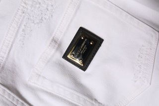 Weiße zerfledderte High-Waist-Jeans aus Baumwolle