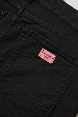 Schwarze figurbetonte Jeans aus Baumwolle mit mittelhohem Bund