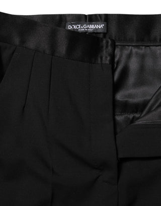 Schwarze Hose aus Wolle mit hohem Bund und schmal zulaufendem Bein