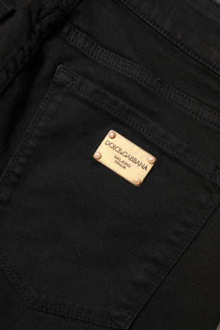 Schwarze figurbetonte Jeans aus Baumwolle mit mittelhohem Bund