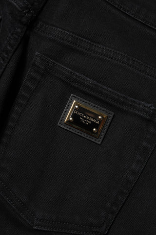 Schwarze Boyfriend-Jeans aus Baumwolle mit ausgestelltem Bein
