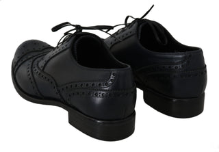 Dunkelblaue Wingtip Oxford Lederschuhe